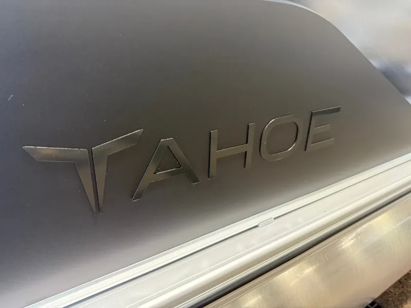 Slide: The Image of Close-up of the Tahoe logo on a boat. - 35