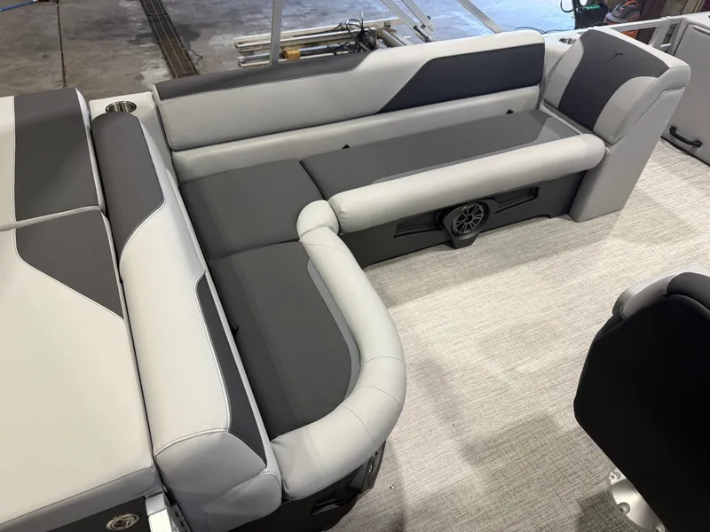 Slide: The Image of The interior of the 2027 Tahoe Sport 2180 Cruise features gray and black upholstery. - 18