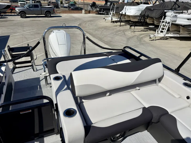 Slide: The Image of The image shows the deck of an Avalon 25' LSZ VRB with sleek seating and modern design. - 10