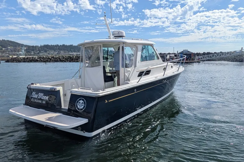 Slide: The Image of 2008 Back Cove 29 boat named "Blue Moon" on water in Bellingham, WA. - 3