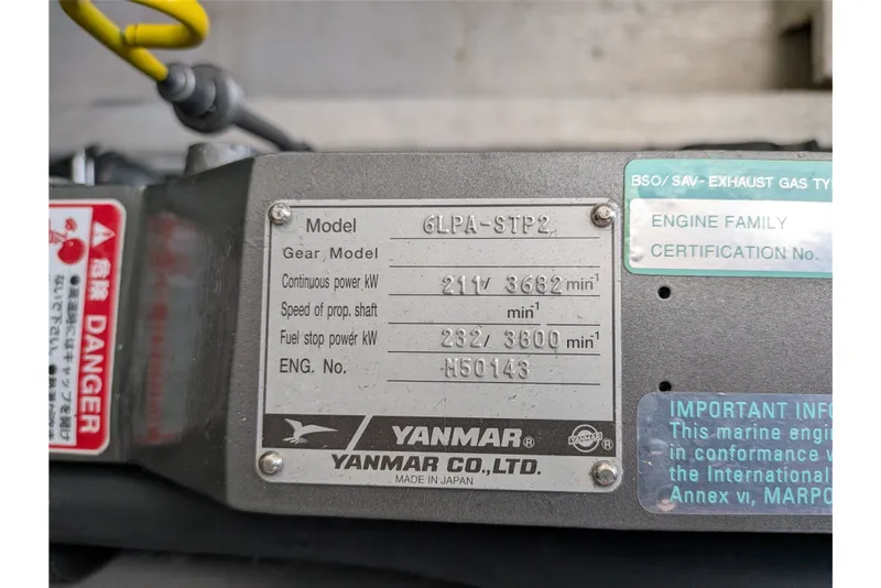 Slide: The Image of Yanmar engine label on a 2008 Back Cove 29 boat, displaying model and power specifications. - 44
