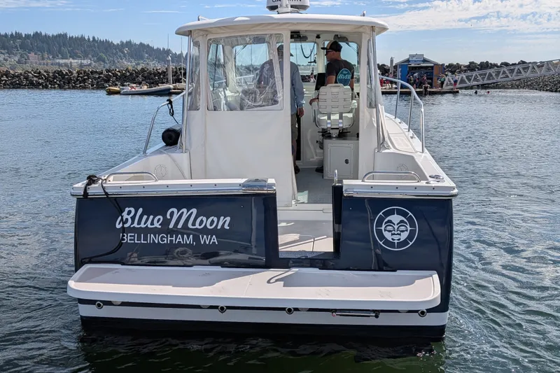 Slide: The Image of 2008 Back Cove 29 boat named "Blue Moon" docked in Bellingham, WA. - 5