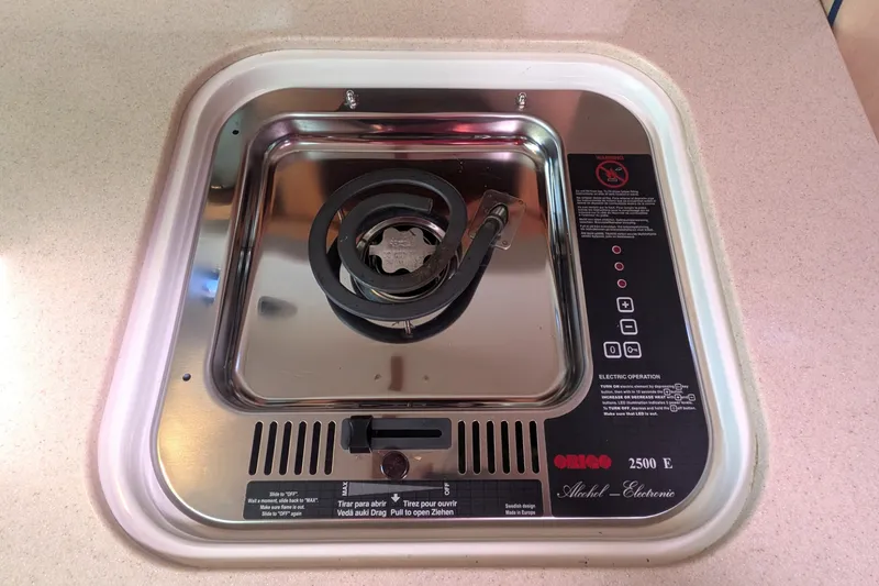 Slide: The Image of Built-in Origo 2500 E alcohol-electric stove on 2008 Back Cove 29 boat. - 29