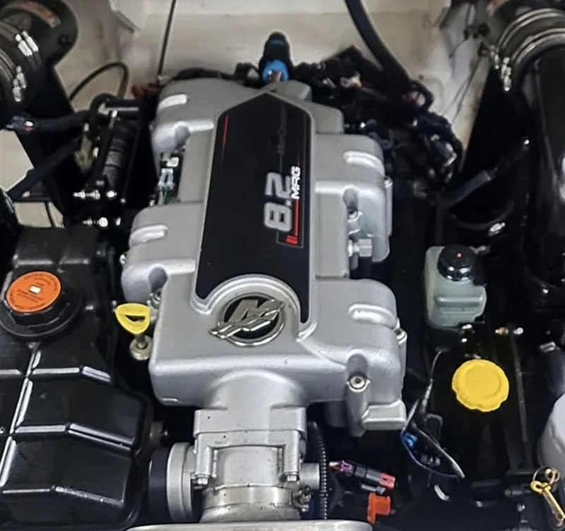 Slide: The Image of An engine compartment with a powerful engine, appearing clean and well-maintained. - 9