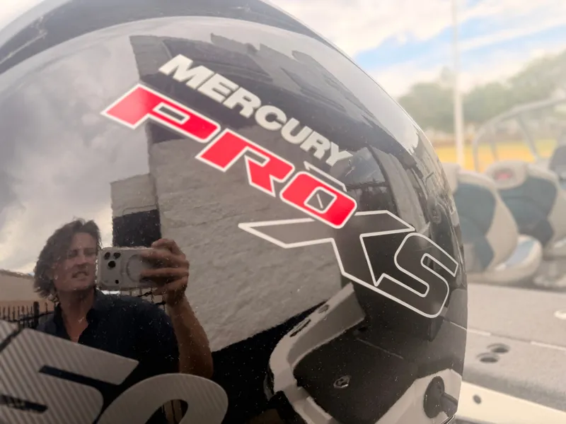 Slide: The Image of Close-up of a Mercury Pro XS outboard motor on a Ranger 1850 MS boat. - 22