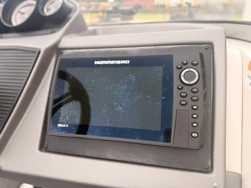 Slide: The Image of A Humminbird fish finder is integrated into the dashboard of a 2024 Ranger 1850 MS. - 14