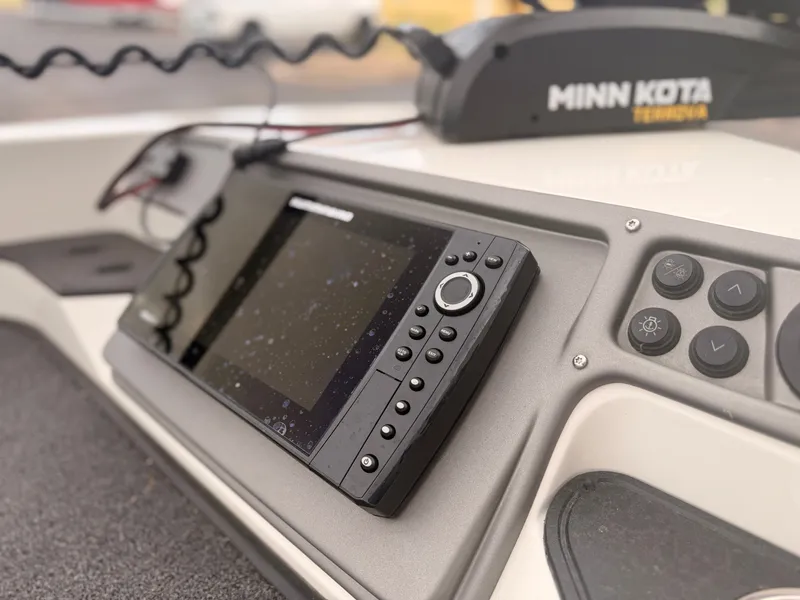 Slide: The Image of The image shows a modern navigation system on a 2024 Ranger 1850 MS boat. - 16