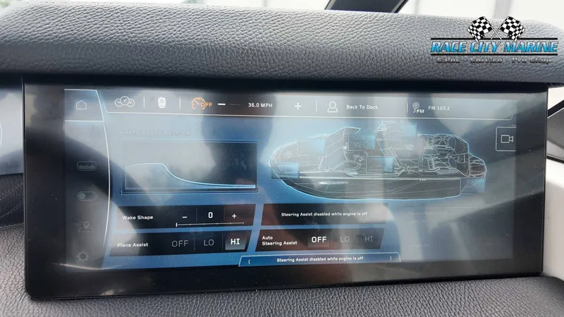 Slide: The Image of The image shows a digital dashboard with a boat schematic and various control options. - 40