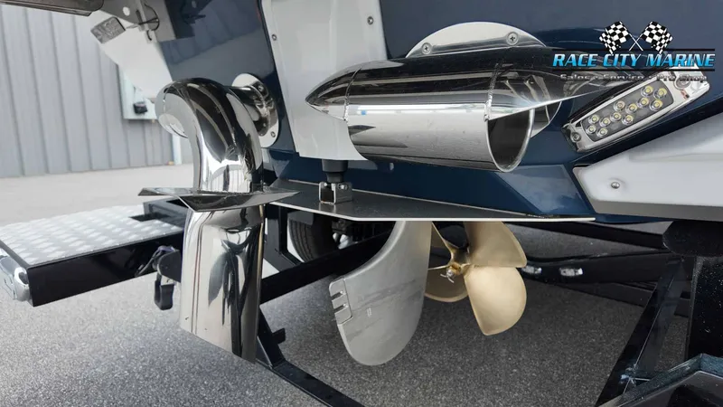 Slide: The Image of Close-up of a 2027 Nautique P23's stern with propeller and exhaust. - 10