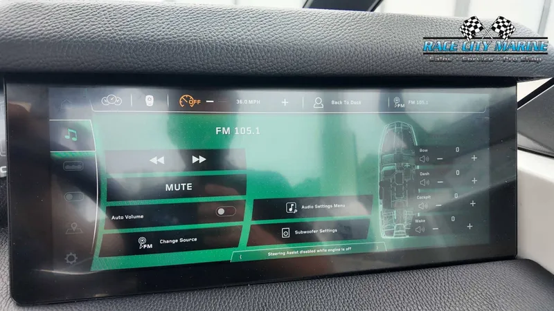 Slide: The Image of The image shows a modern boat dashboard with a digital display showing audio settings. - 41