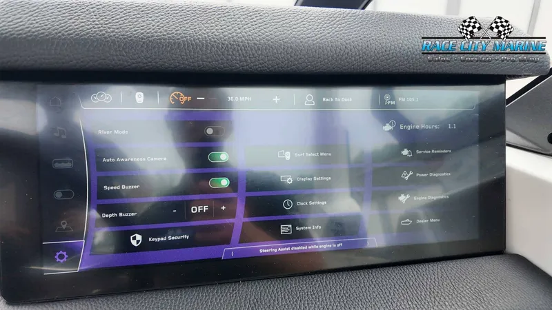 Slide: The Image of The image shows a modern boat dashboard with a digital display and various control options. - 47
