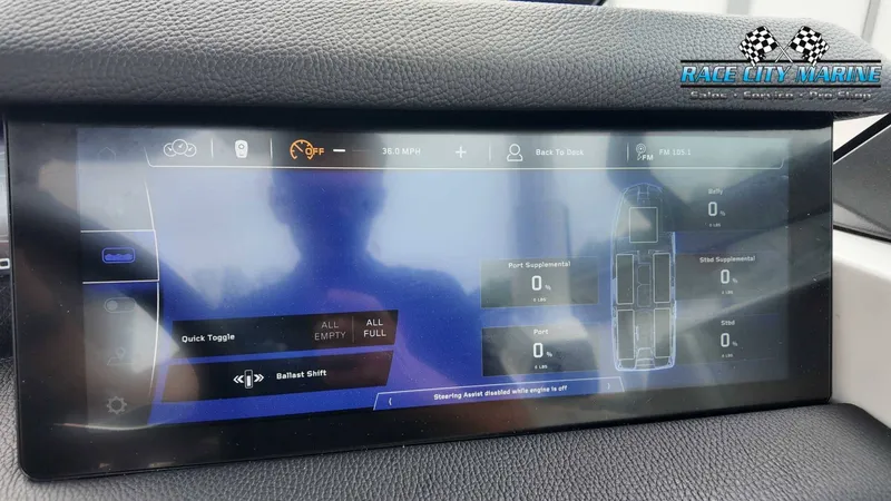 Slide: The Image of The image shows a digital dashboard with various control options for a boat. - 37