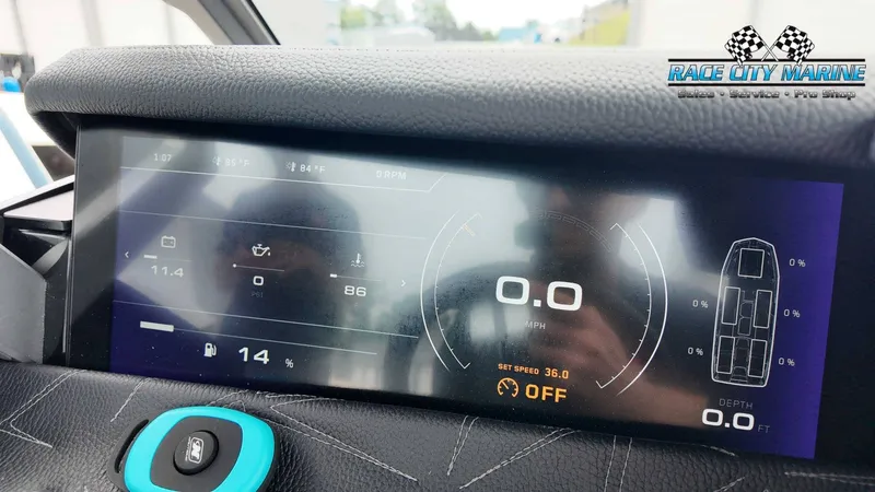 Slide: The Image of The image shows a modern boat dashboard with digital displays and controls. - 48