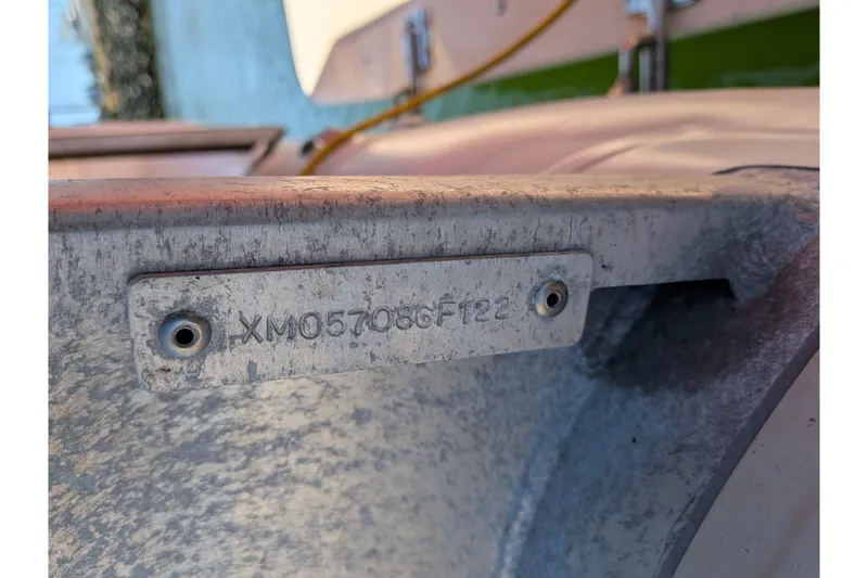 Slide: The Image of Hull identification number on a 1997 Nordic Tug 32 boat. - 14