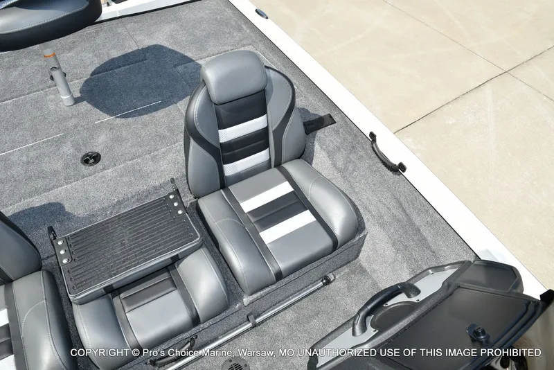 Slide: The Image of The image shows the interior of a Ranger RT198P boat with gray and black seating. - 47
