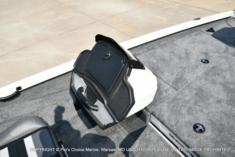 Slide: The Image of The image shows the cockpit of a Ranger RT198P boat with gray carpeting and a black helm console. - 41