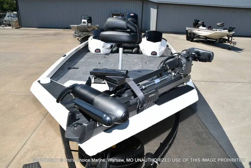 Slide: The Image of A 2027 Ranger RT198P boat is on a trailer in an outdoor area. - 9