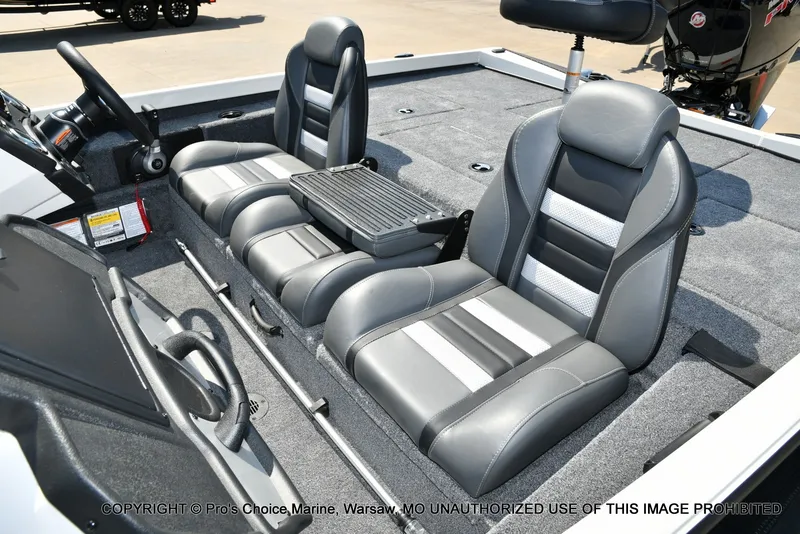 Slide: The Image of The image shows the seats of a Ranger RT198P boat with gray and black upholstery. - 16