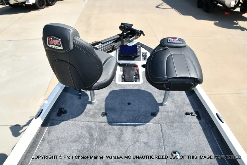 Slide: The Image of The image shows the cockpit of a Ranger RT198P with two black seats and a control console. - 49