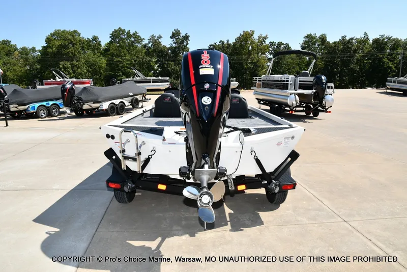 Slide: The Image of A 2027 Ranger RT198P boat on a trailer in an outdoor area. - 6