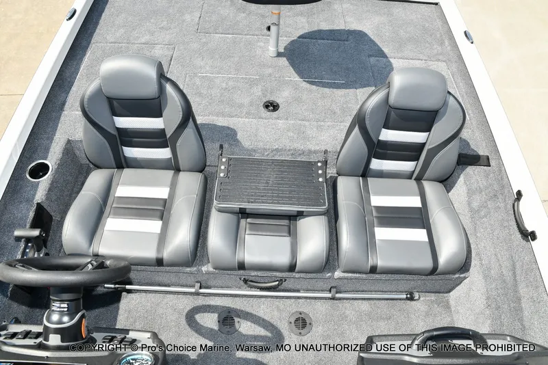 Slide: The Image of The image shows the cockpit of a Ranger RT198P with two gray seats and a small table. - 22