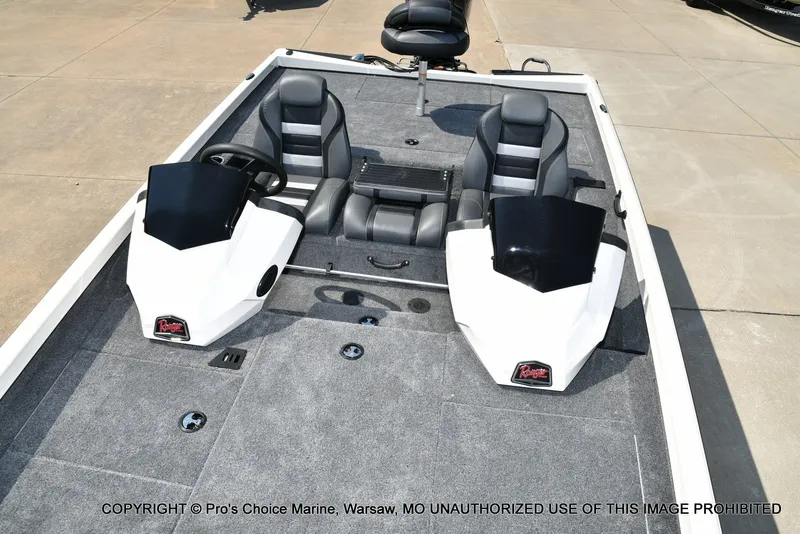 Slide: The Image of The image shows the cockpit of a Ranger RT198P boat with two seats and a helm station. - 21