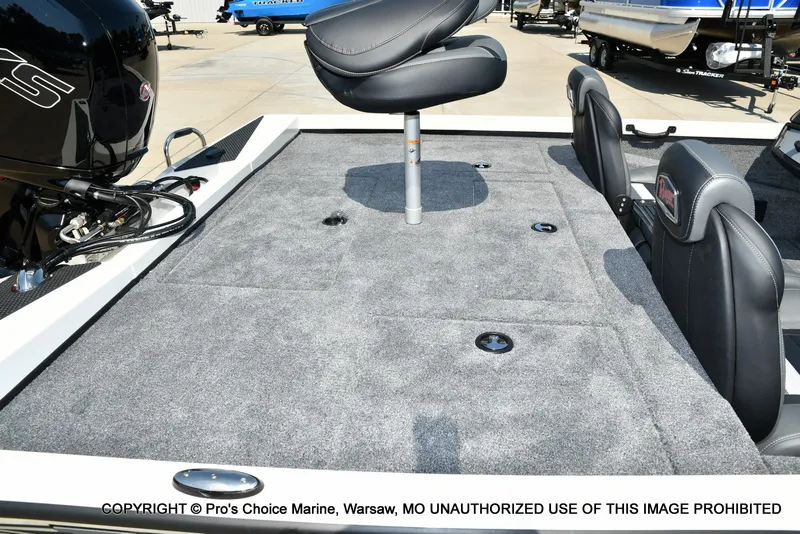 Slide: The Image of The image shows the deck of a Ranger RT198P boat with gray carpeting and a seat. - 28