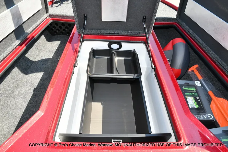 Slide: The Image of The image shows the storage compartment of a 2027 Nitro Z20 XL Pro boat with a black insert. - 44