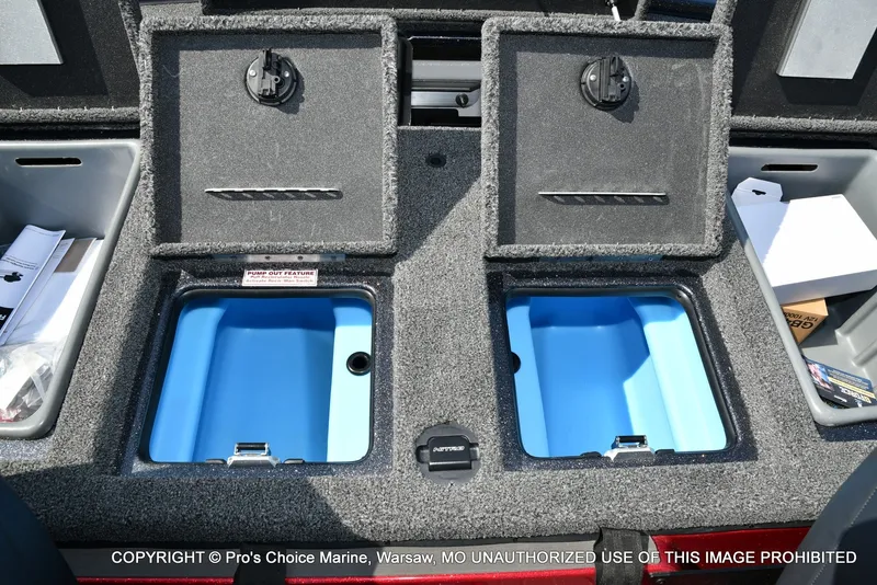 Slide: The Image of The image shows two open storage compartments with blue interiors on a boat. - 50