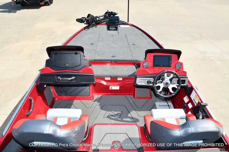Slide: The Image of The image shows the cockpit of a Nitro Z20 XL Pro boat with two seats and a helm. - 28