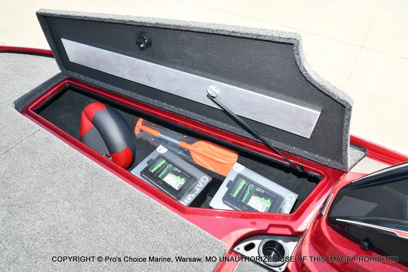 Slide: The Image of The image shows an open storage compartment of a Nitro Z20 XL Pro boat with batteries and safety gear. - 48
