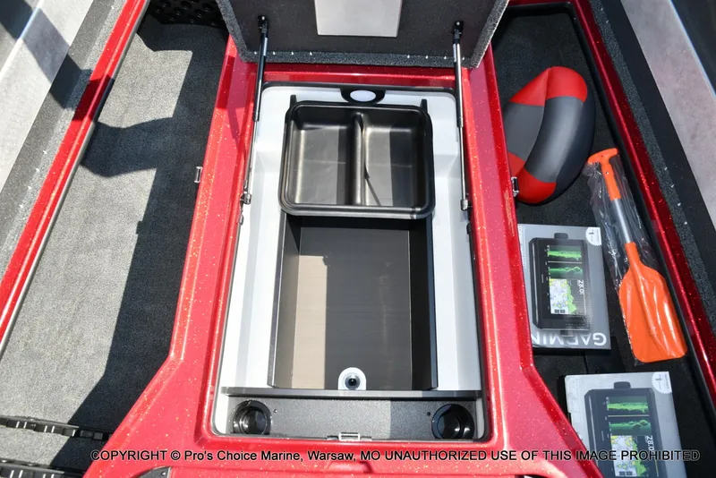 Slide: The Image of The image shows the storage area of a Nitro Z20 XL Pro boat with a black container and accessories. - 45