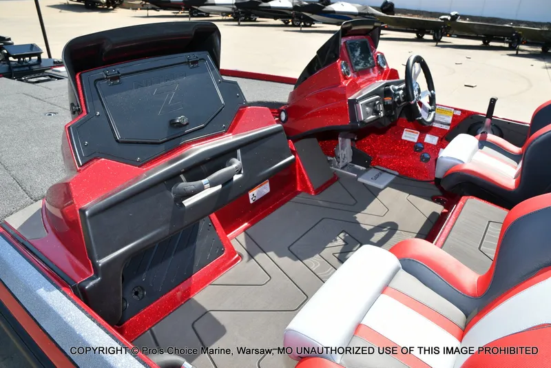 Slide: The Image of The image shows the cockpit of a Nitro Z20 XL Pro boat with red and gray seats. - 14