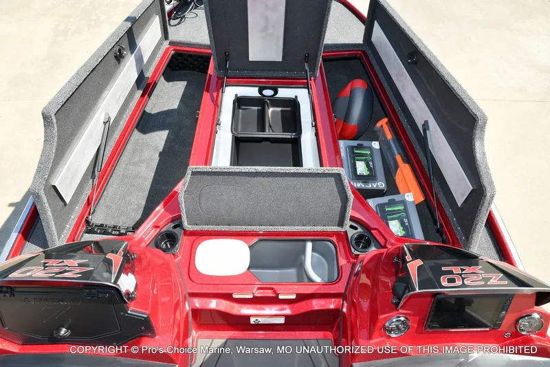 Slide: The Image of The image shows the open deck of a Nitro Z20 XL Pro boat with storage and batteries. - 22