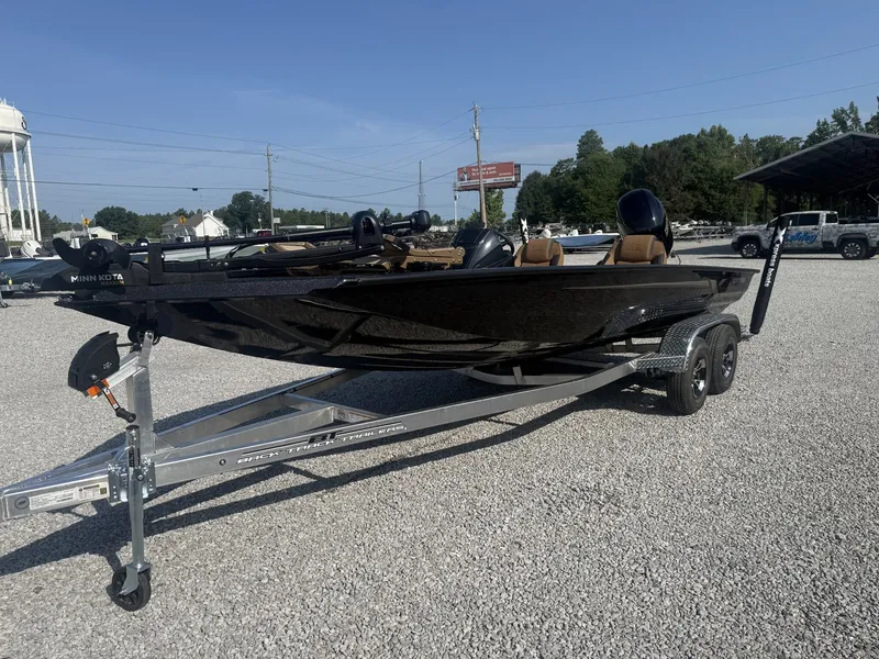 Slide: The Image of A 2027 Xpress H20 Crappie boat on a trailer. - 5