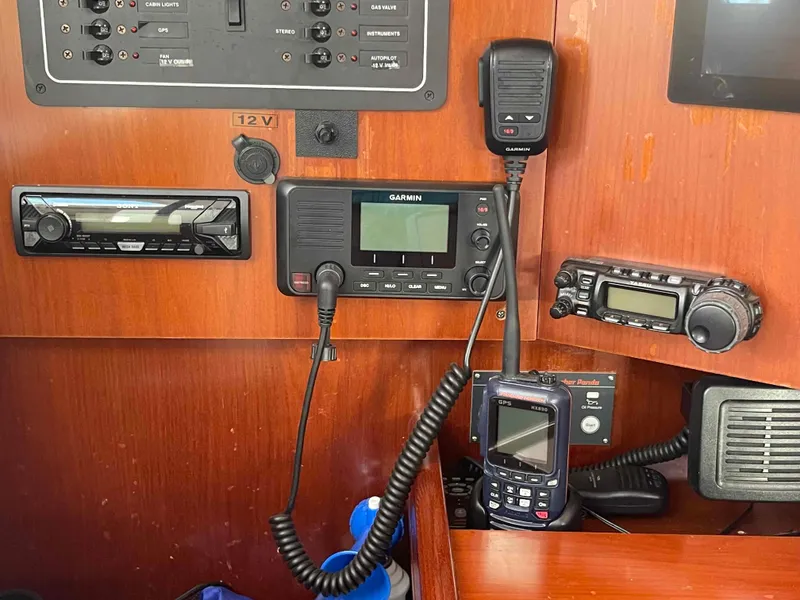 Slide: The Image of Control panel of a 2004 Beneteau 361 sailboat with communication devices. - 47