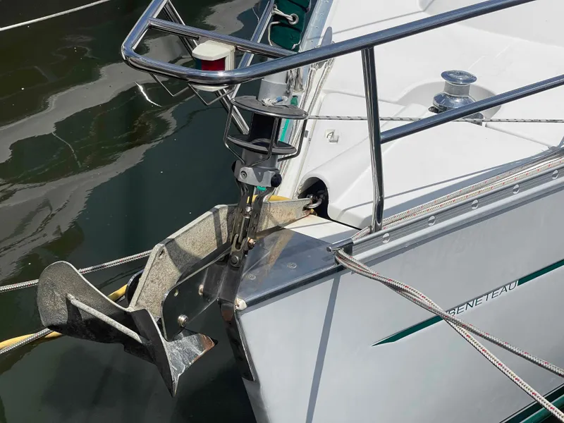 Slide: The Image of Bow of 2004 Beneteau 361 sailboat with anchor and railing details. - 33