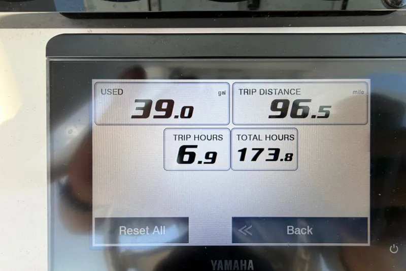Slide: The Image of Boat dashboard showing fuel usage, trip distance, and hours for 2022 Sea Hunt Ultra 239SE. - 24
