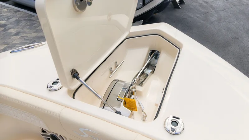 Slide: The Image of The 2027 Scout 260 LXF features an open anchor locker with anchor and rope. - 20