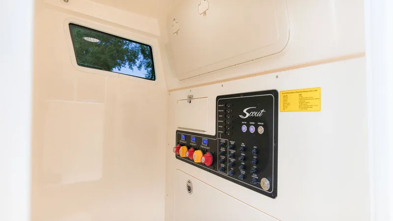 Slide: The Image of Interior of a 2027 Scout 260 LXF with control panel and window. - 21