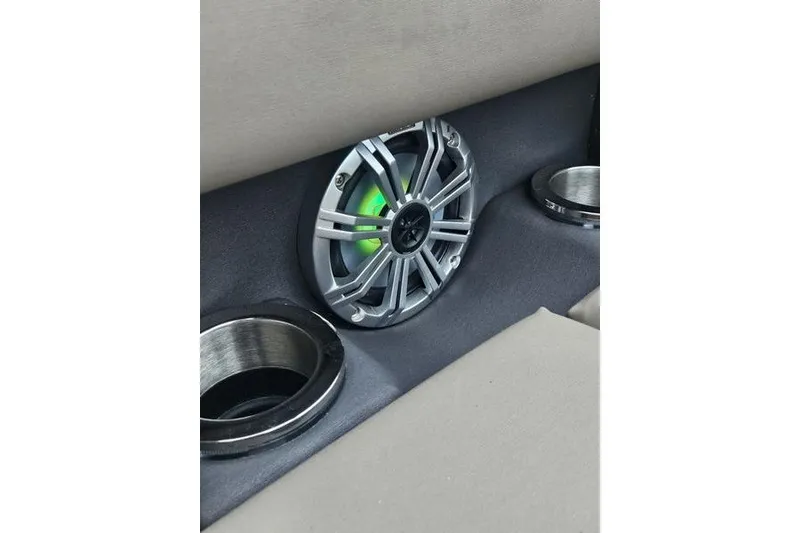 Slide: The Image of Speaker and cup holders in 2019 Bennington SX 23 SPDXP boat interior. - 9