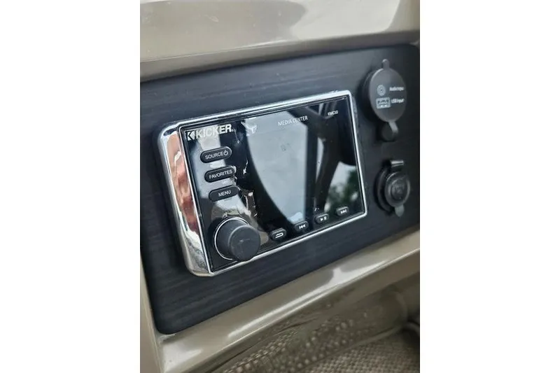 Slide: The Image of 2019 Bennington SX 23 SPDXP media center with Kicker audio system. - 10