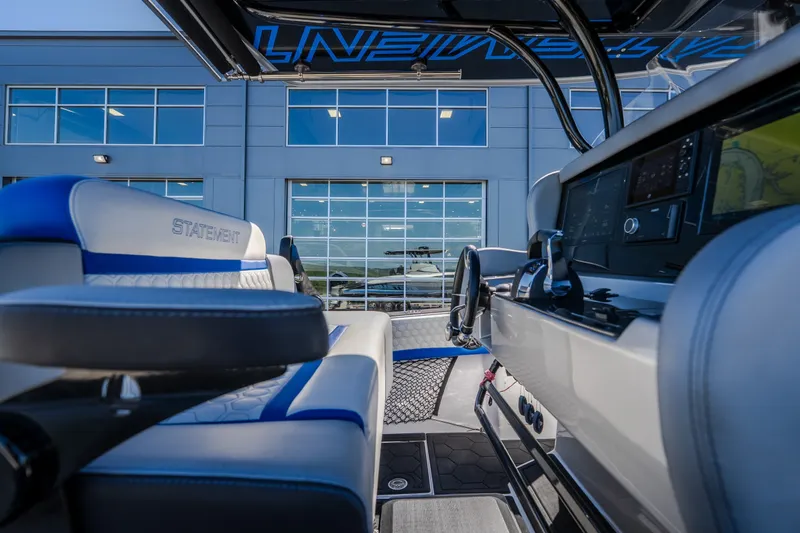 Slide: The Image of Interior view of 2022 Statement 350 Open boat with modern controls and seating. - 59