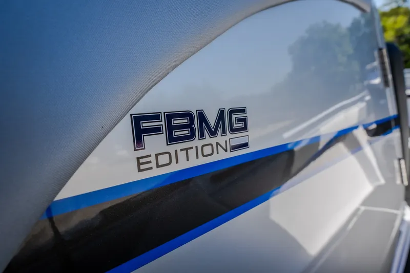 Slide: The Image of 2022 Statement 350 Open FBMG Edition boat detail with sleek design and branding. - 33