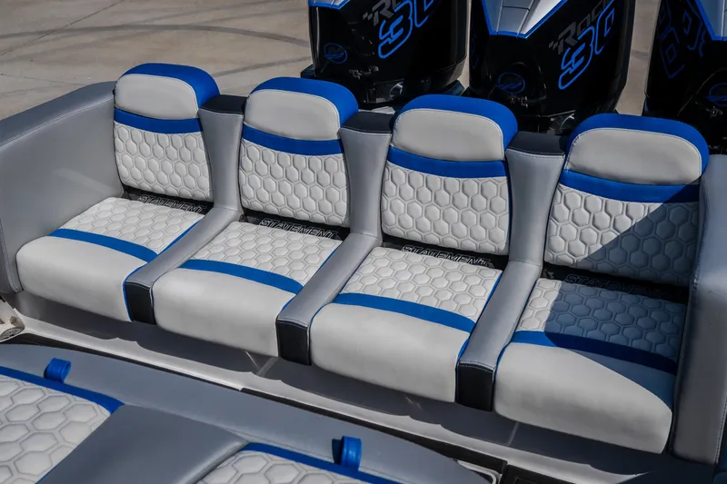 Slide: The Image of Luxurious seating on 2022 Statement 350 Open boat with blue and gray accents. - 24
