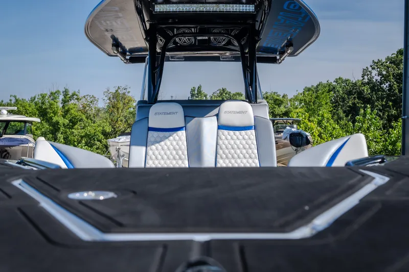 Slide: The Image of 2022 Statement 350 Open boat interior with luxurious seating and sleek design. - 53