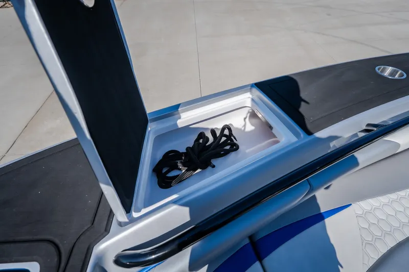 Slide: The Image of Open storage compartment on 2022 Statement 350 Open boat with coiled rope inside. - 39