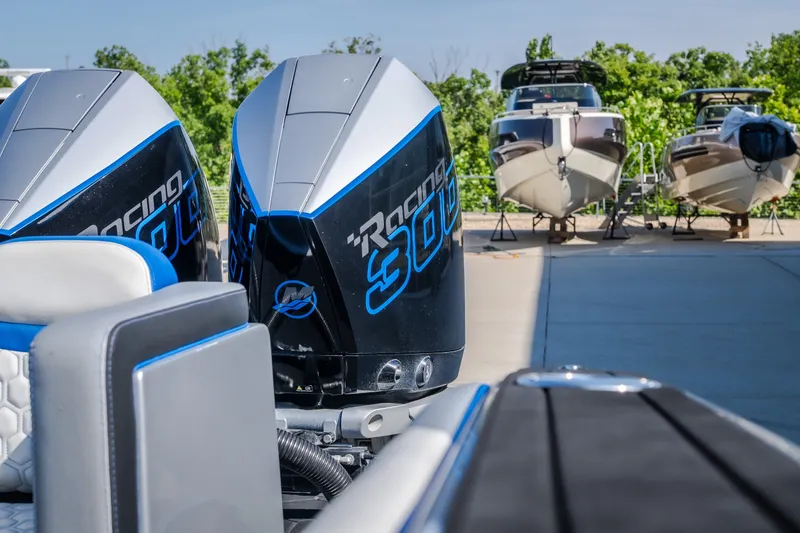 Slide: The Image of Twin Mercury Racing 300 outboard engines on a 2022 Statement 350 Open boat. - 23