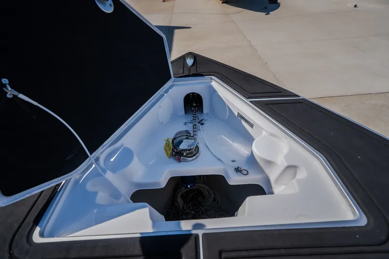 Slide: The Image of Open storage compartment of 2022 Statement 350 Open boat, showcasing interior details. - 38