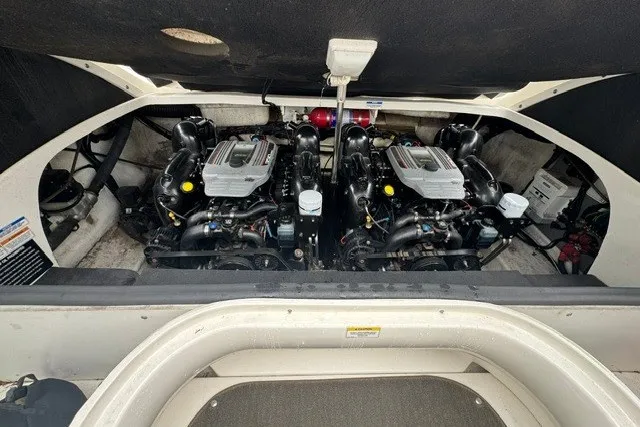 Slide: The Image of Engine compartment of a 2016 Sea Ray 300 SLX boat, showcasing dual engines. - 24